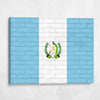 Guatemala National Flag on Brick Texture