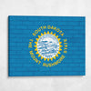 South Dakota State Flag on Brick Texture